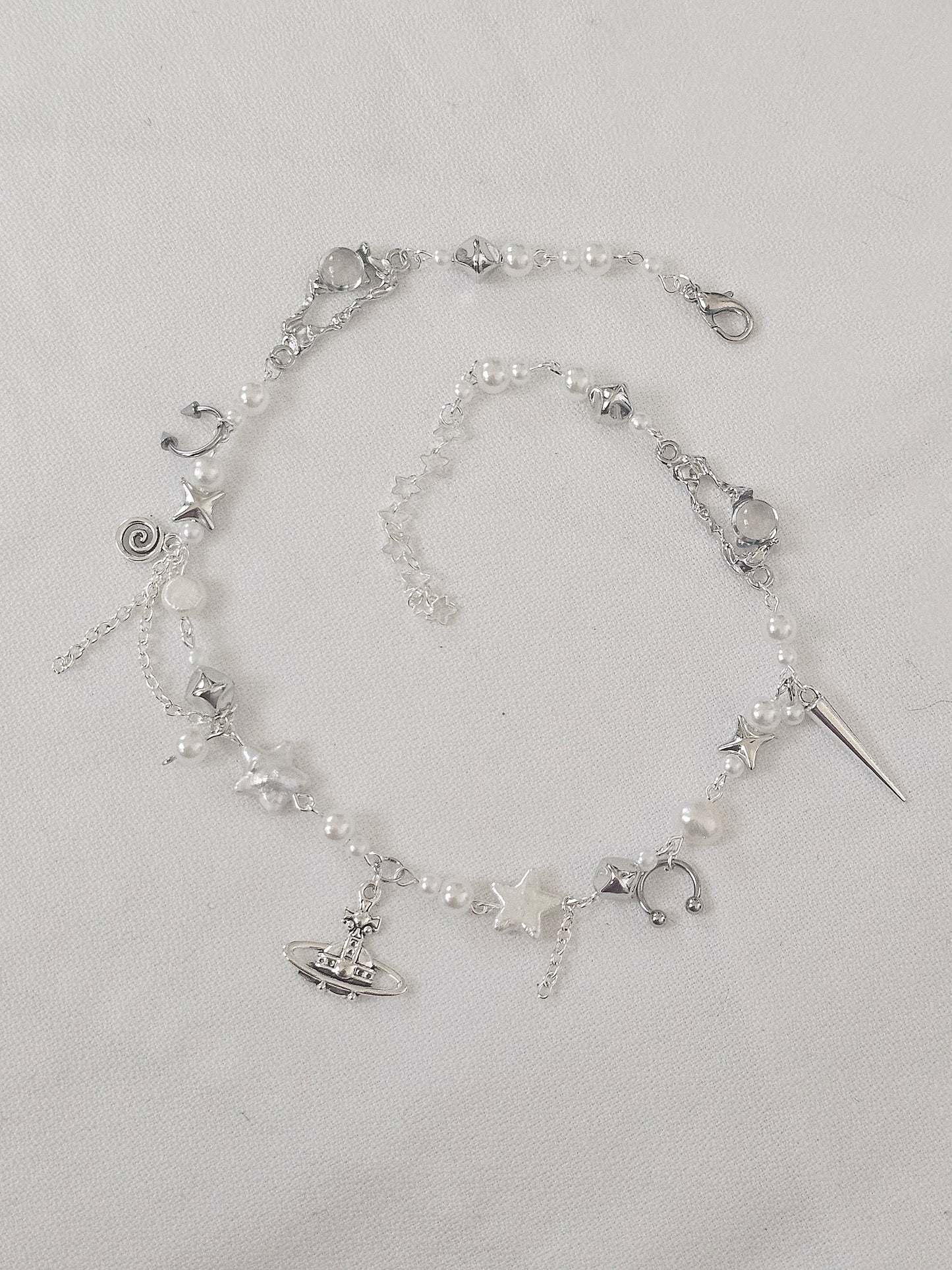 PIERCED saturn necklace